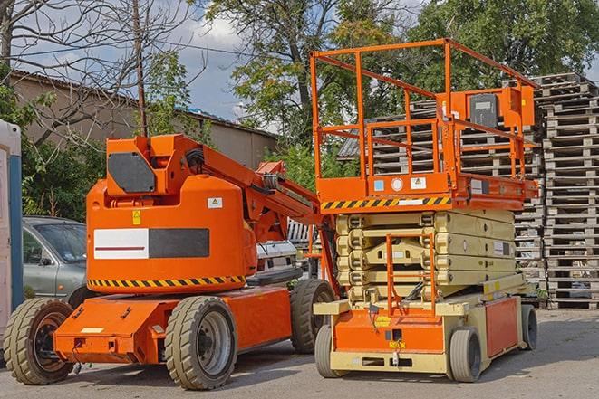 busy forklift activity in a well-maintained warehouse facility in Byron